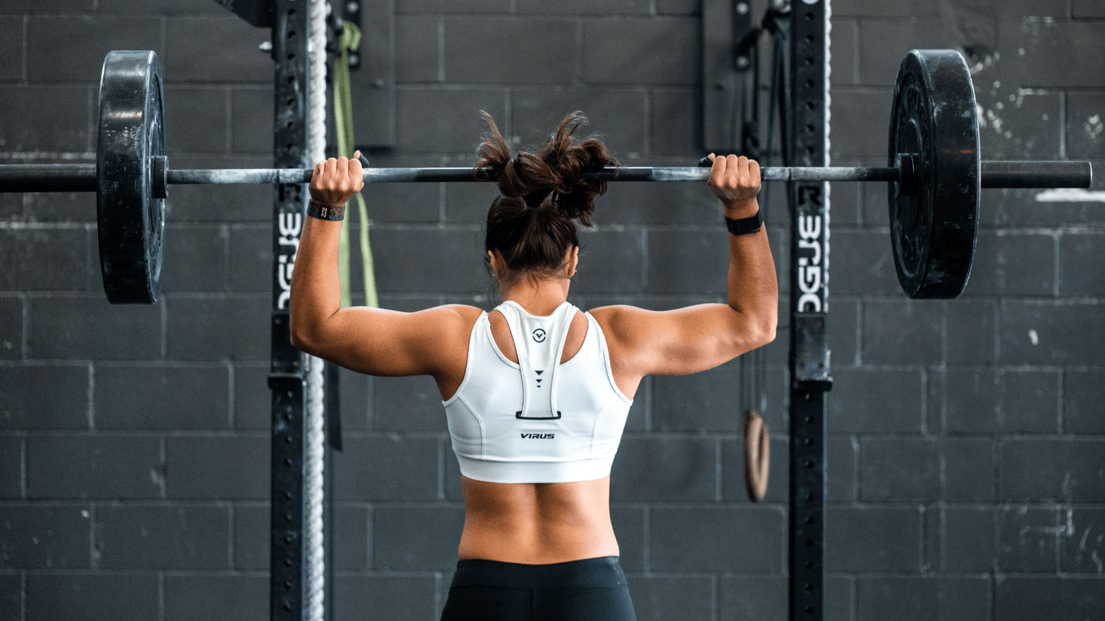 Why Stratos Pre-Workout is a Game-Changer for Your Workout : Woman lifting