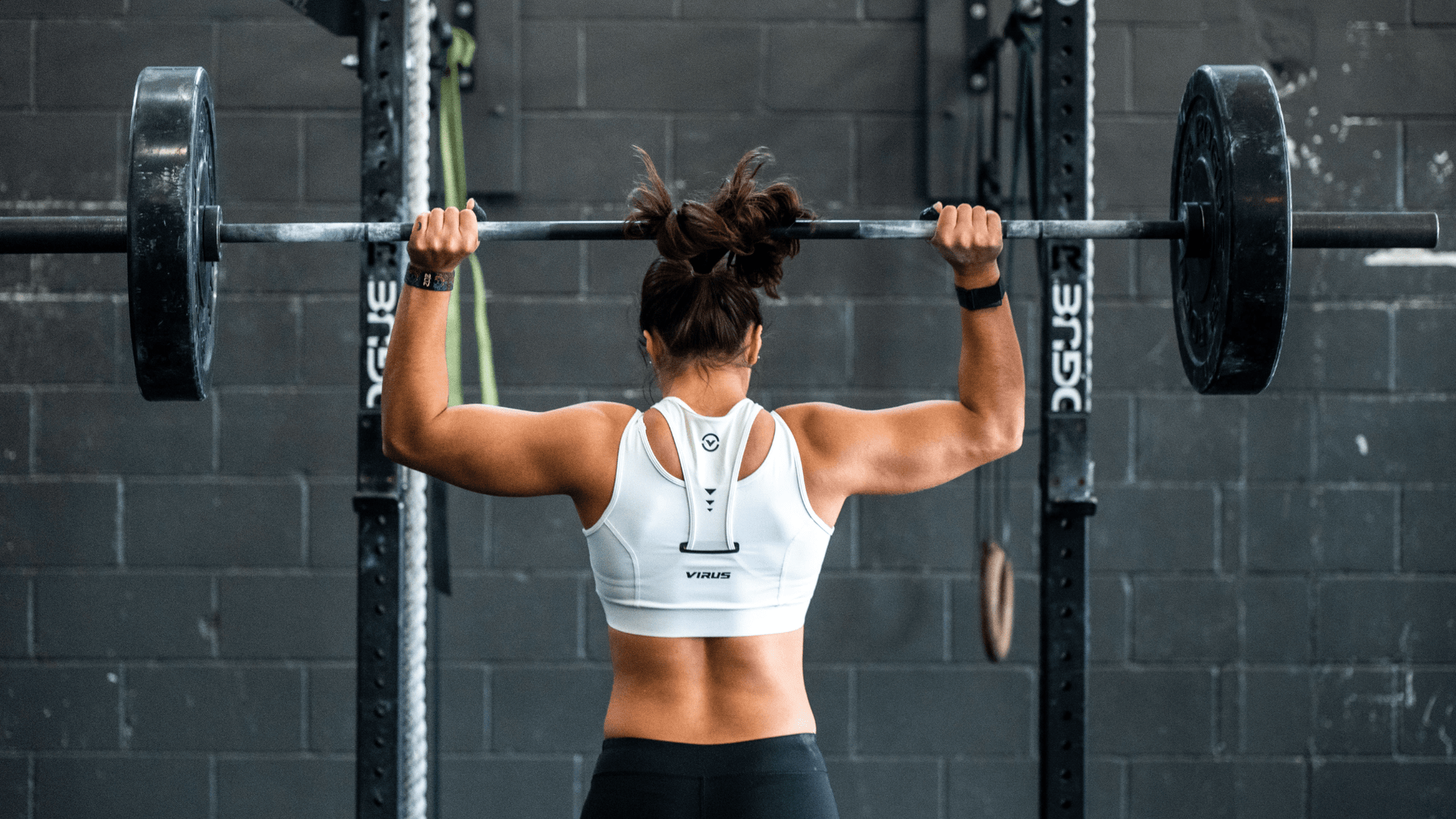Why Stratos Pre-Workout is a Game-Changer for Your Workout : Woman lifting 